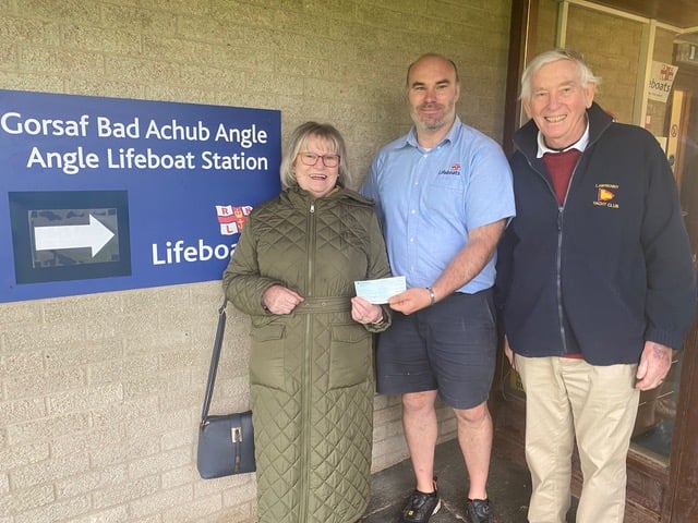 Keith and Dee Williams (Lawrenny Yacht Club and Water Users) presenting a cheque for £240 to Angle Lifeboat at their new base in Milford Haven.  The money was raised in a raffle at a recent barbecue at the Lawrenny Arms.