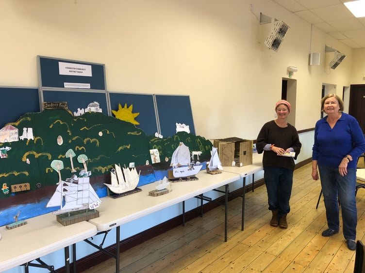 Pictured left Fran Evans and right Jan Howell Chair Cosheston Community History Group in front of the Cosheston School display