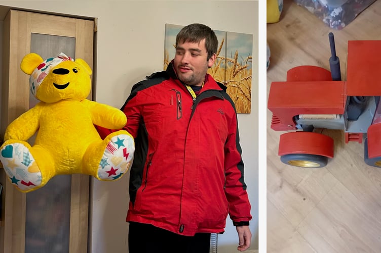 George MacCreath with Pudsey and the hand-crafted wooden tractor