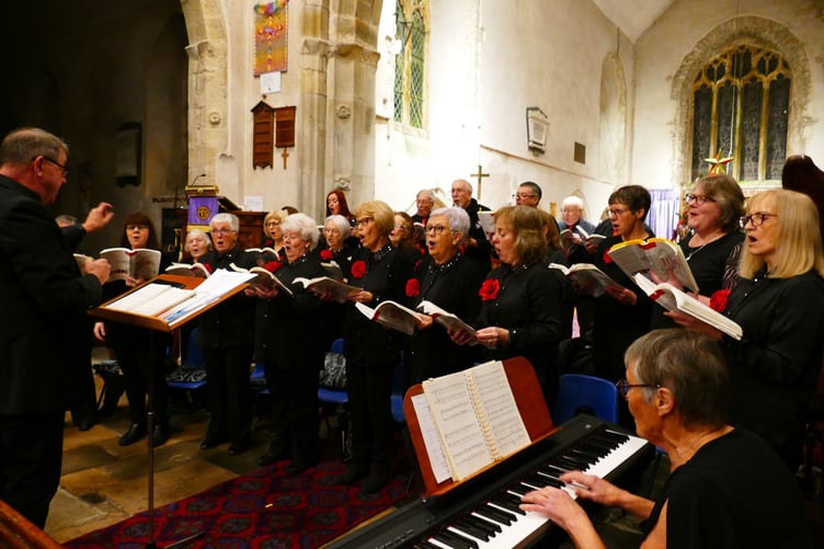 Quaynotes singing carols at Carew Cheriton in 2023