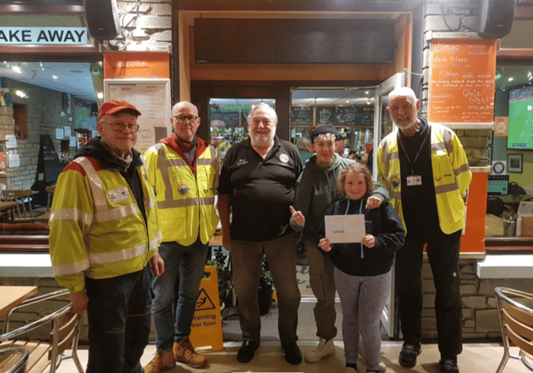 The two female winners Kirsty and Caley are pictured with three members of Blood Bikes Wales and one of the organisers of the Amroth Open Beach Fishing Competition, John O’Connor.