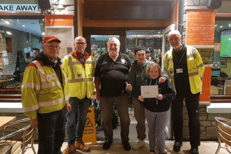 The two female winners Kirsty and Caley are pictured with three members of Blood Bikes Wales and one of the organisers of the Amroth Open Beach Fishing Competition, John O’Connor.