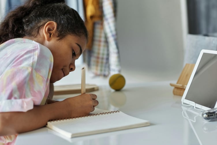 child writing - creative