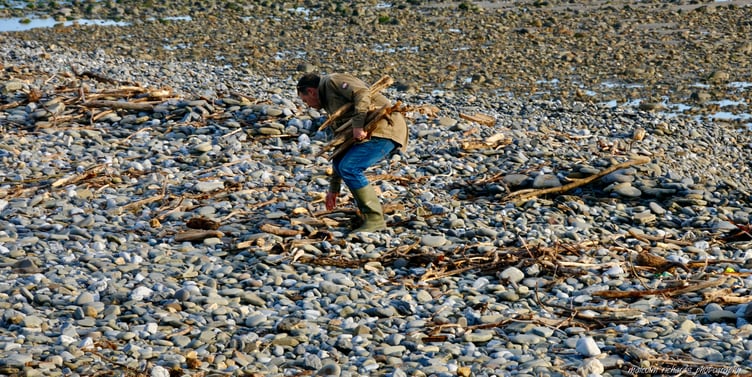 Scene at Amroth in Pembrokeshire where the latest storms have washed away the village beach, leaving a surface of rocks and stones. Photo: Malcolm Richards