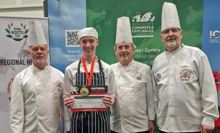 Carmarthenshire’s Harry Howell receives his award from Colin Gray and Arwyn Watkins, OBE from the Culinary Association of Wales and Domenico Maggi.