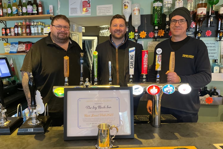 Samuel Kurtz MS, Jamie Zylstra, Logistics Team Leader at Templeton Beer Wine & Spirit Co presenting prizes to Best Local Pub competition winner Jason Vaughan at the Ivy Bush Inn in Narberth