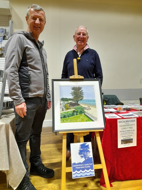Lonely Tree painting artist Andrew Phillips and SLTPS chairman Martyn Williams BEM