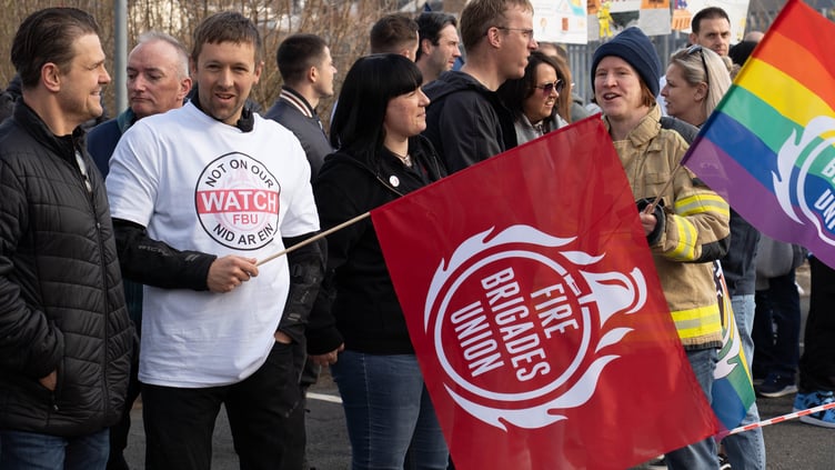 Over 200 firefighters and supporters gathered at a rally outside Mid and West Wales Fire and Rescue Service