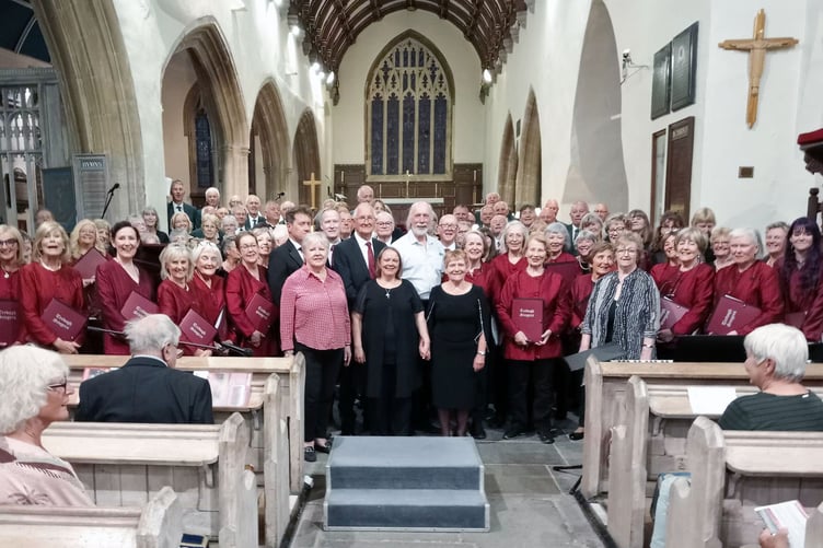The three choirs and musical teams pictured following the concert at St Mary’s Church, Tenby.
