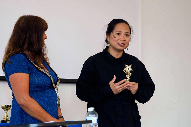 Sherilyn Brookes receiving her volunteer award from Pembroke Dock Mayor Michele Wiggins