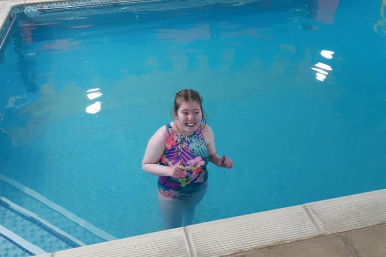 Child supported by the Wish Fund swimming at Llangrannog