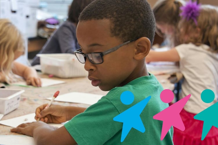 Image for RCPCH article. Boy in green shirt