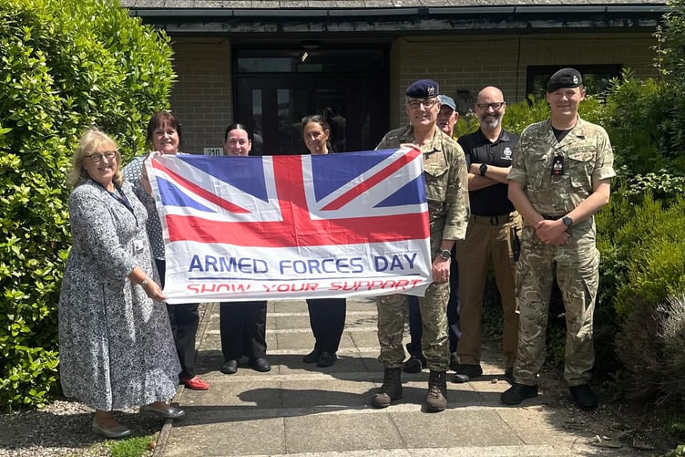 Landmarc and the DIO raising the Armed Forces Day flag at Castlemartin Training Area to celebrate Armed Forces Week 2025.