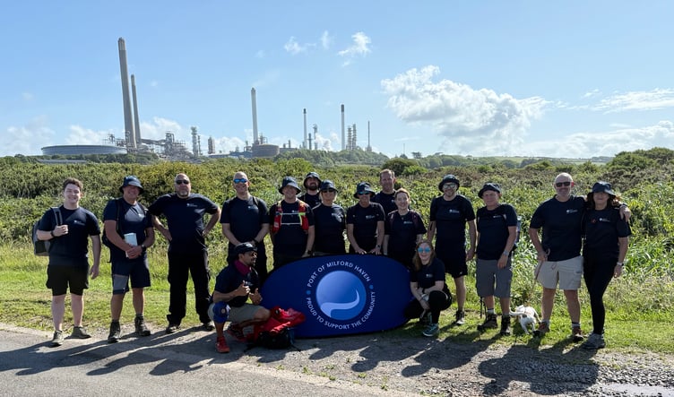 Port of Milford Haven Coastal Challenge hikers passing Valero