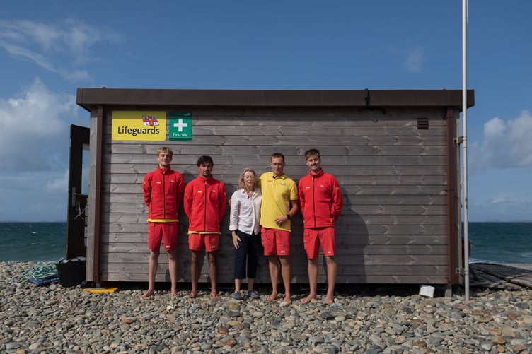 Joanna Hicks with RNLI Lifeguards at Newgale