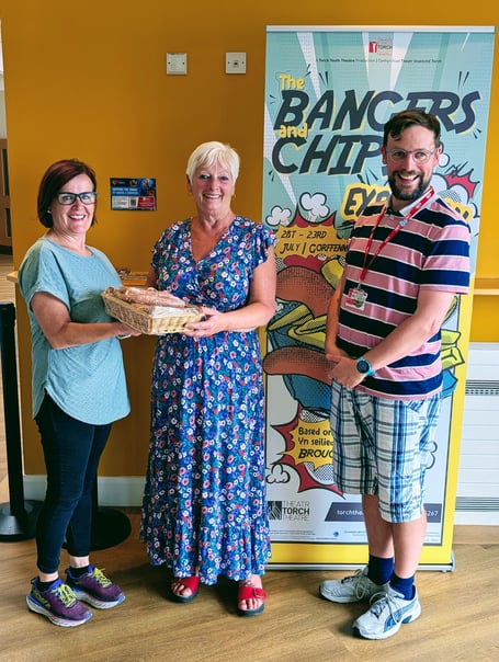 Best Dinner Lady in Pembrokeshire Nicola Wilson receives a delicious sausage hamper from Gate 2 Plate in Haverfordwest, as well as two tickets to see ‘The Bangers & Chips Explosion’.