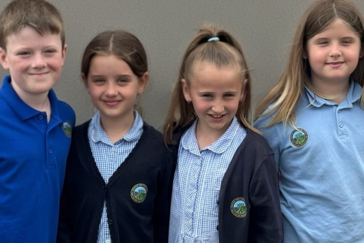Manorbier Pupils Wearing Iron-On Logos