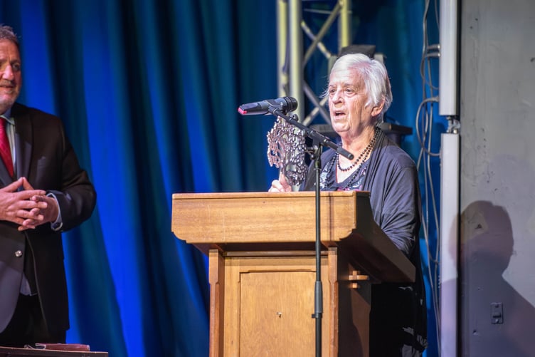 Betty Davies receiving the Eco Warrior award for Jan Hill and Friendship Group committee members