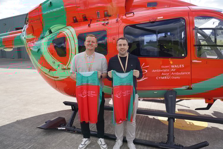 Geoff Harding and James Cronesberry after being presented with their Wales Air Ambulance running shirts