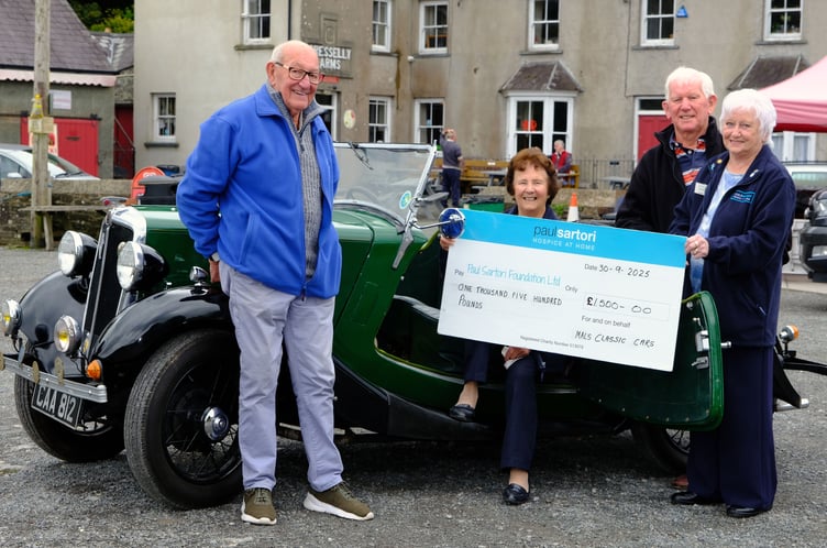 Another summer season of Malcolm Powell’s Classic Car Runs in aid of the Paul Sartori Foundation has come to a close. This year, £1,500 has been donated to the Haverfordwest-based Hospice-at-Home charity. Pictured presenting the cheque outside the Cresselly Arms are Malcolm Powell, Mair Evans, Peter Baker and Val Harrold. Photo: Martin Cavaney