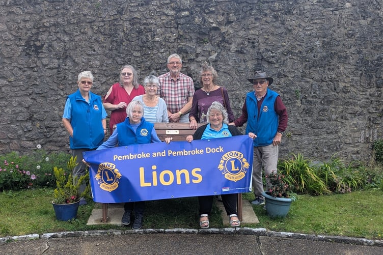 Pembroke and Pembroke Dock Lions with the donated bench