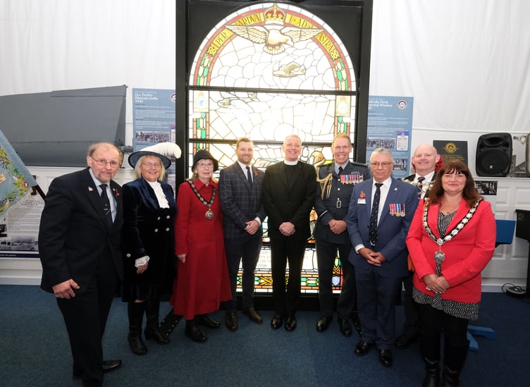 Pictured with the RAF Pembroke Dock Memorial Window are, left to right: Heritage Trust Patron John Evans; High Sheriff Mrs Ann Jones; Chair of Pembrokeshire County Council, Councillor Maureen Bowen; Senedd Member Sam Kurtz; RAF Chaplain-in-Chief, the Venerable Giles Legood; Air Officer Wales, Air Commodore Rob Woods; the Chairman of the Heritage Trust; Rik Saldana; Mayor of Pembroke, Councillor Gareth Jones, and Mayor of Pembroke Dock, Councillor Michele Wiggins.