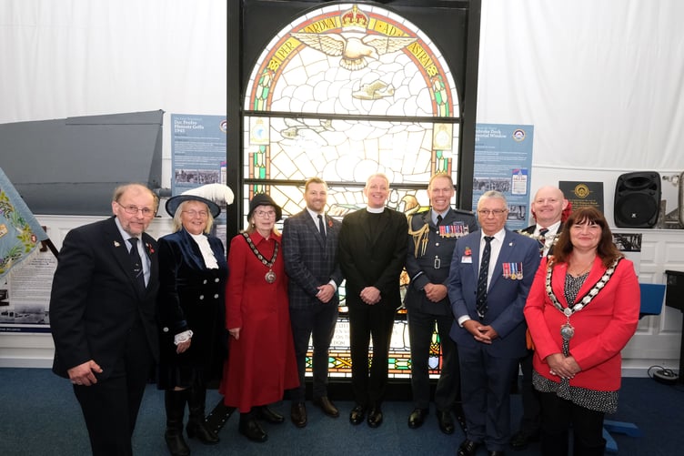 Pictured with the RAF Pembroke Dock Memorial Window are, left to right: Heritage Trust Patron John Evans; High Sheriff Mrs Ann Jones; Chair of Pembrokeshire County Council, Councillor Maureen Bowen; Senedd Member Sam Kurtz; RAF Chaplain-in-Chief, the Venerable Giles Legood; Air Officer Wales, Air Commodore Rob Woods; the Chairman of the Heritage Trust; Rik Saldana; Mayor of Pembroke, Councillor Gareth Jones, and Mayor of Pembroke Dock, Councillor Michele Wiggins.