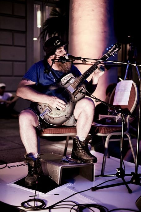 Big Bone Jone with a steel-bodied resonator guitar