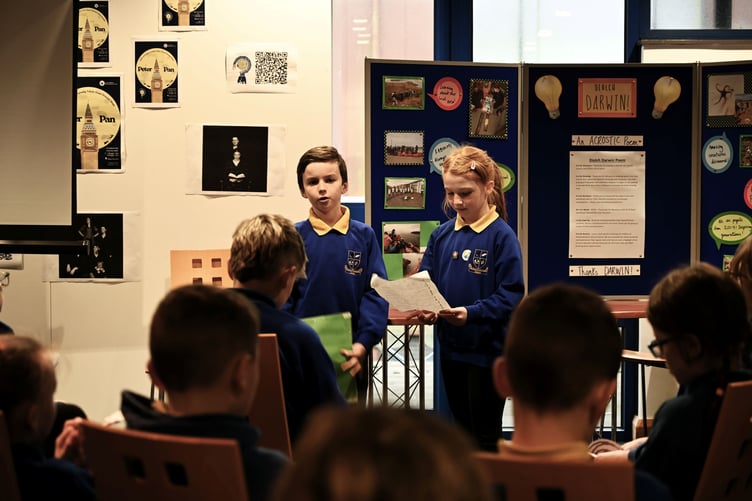 Neyland pupils presenting their work with the Darwin Centre over the past 20 years