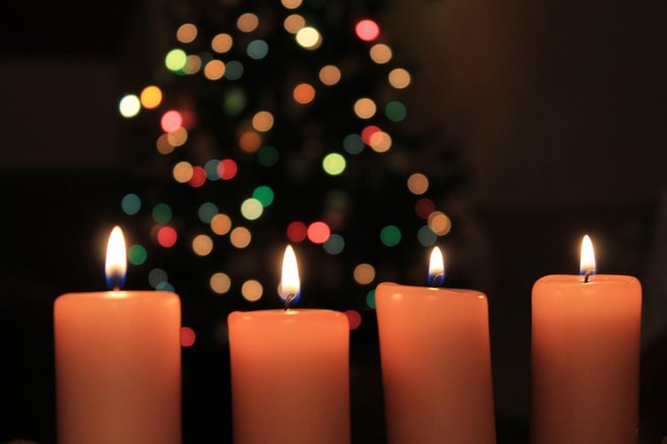 Candles and Christmas lights - candlelit