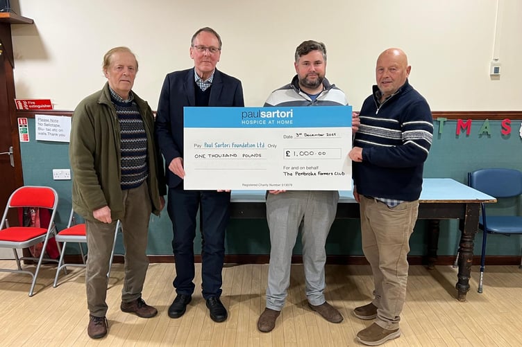 In the photo are Mr Edward Morris (treasurer), Mr Paul Lister from Paul Sartori, Mr George Rees (past chair) and Mr Anthony Davies (past president).