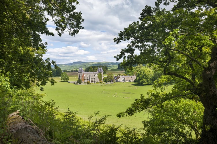 The west front of Newton House seen from Brown's Walk at Dinefwr, Carmarthenshire, Wales. Dinefwr is a National Nature Reserve, historic house and 18th-century landscape park, enclosing a medieval deer park.