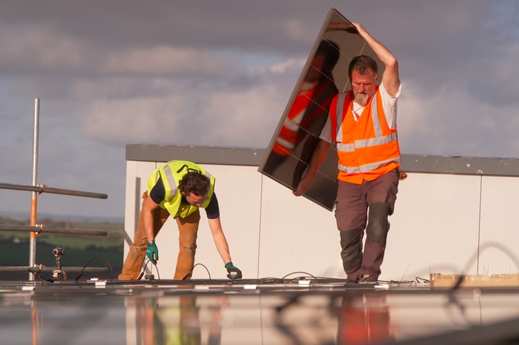 Solar panels being installed at Ysgol Harri Tudur