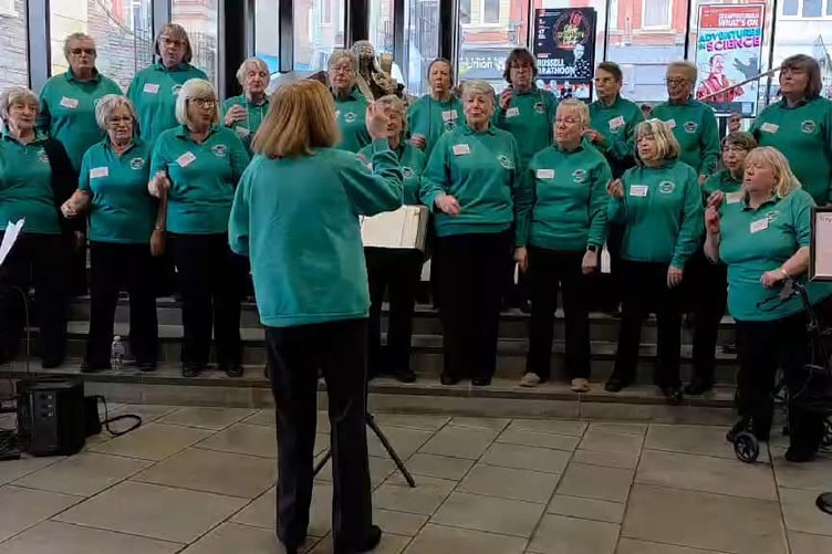 Neyland Ladies Choir performing in the Atrium at Maesteg