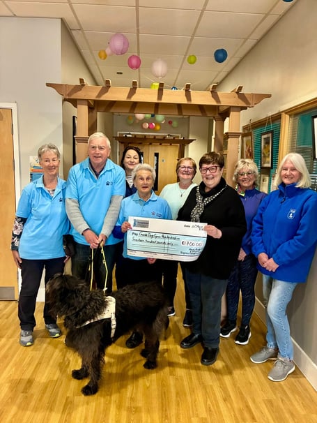 Seen at the cheque presentation are Soroptimists Ruth Howells, and Deena Irving with Eva Rich, Sheila Ravenscroft, Helen Hedley, Lynn Knibbs, Libby, Adge John and his guide dog Skip.