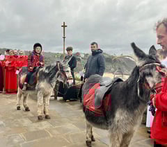 Donkey-led Palm Sunday procession in Tenby
