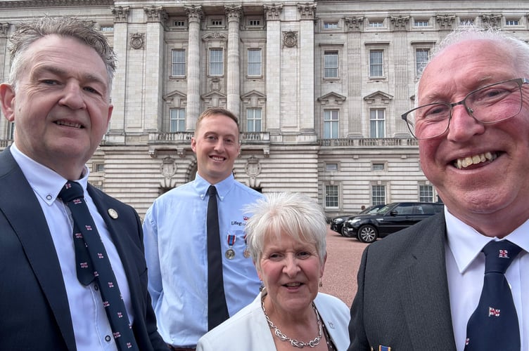 RNLI representatives (L to R) Gary Jones, Matty Meclod, Christine Collins and Gareth Horner MBE at Buckingham Palace for Queen Elizabeth II centenary