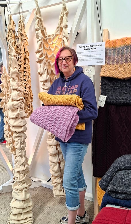 Joy Franklin with some of her products made from recycled textiles