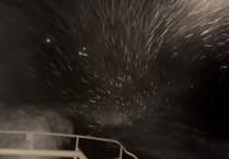 Lifeboat saves two in perilous seas