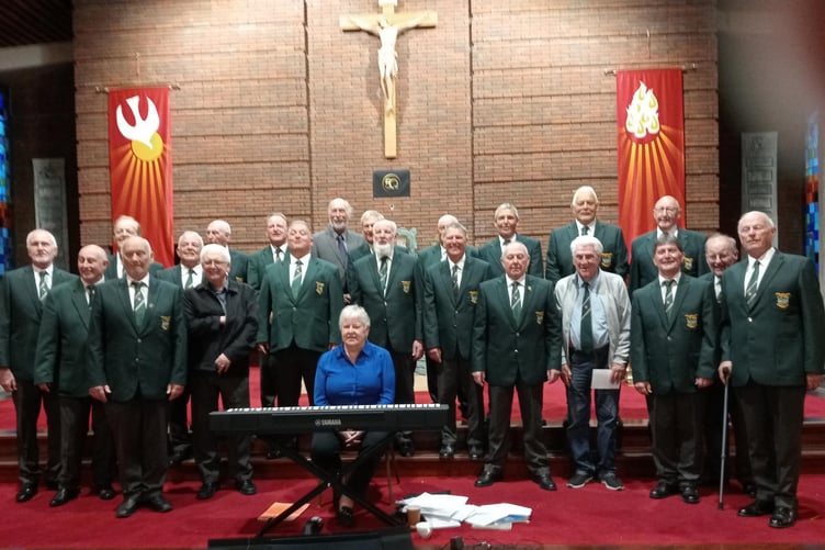 Musical Director Juliet Rossiter, Accompanist William Lambert and Pembroke and District Male Voice choristers at St Anthony’s Church, Clontaf, with Bryan Hoey and Father Larry White.